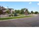 Attractive community entrance with lush landscaping and a prominent Colorado-themed sign at 14823 W 70Th Dr # A, Arvada, CO 80007