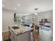 Open kitchen and living area, great for entertaining. Features granite countertops and stainless steel appliances at 14823 W 70Th Dr # A, Arvada, CO 80007