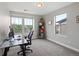 Bright office space filled with light from large windows overlooking the green outdoor scenery at 14823 W 70Th Dr # A, Arvada, CO 80007