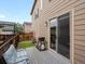 Outdoor patio with seating area, grill, and sliding door for easy indoor/outdoor access at 14823 W 70Th Dr # A, Arvada, CO 80007