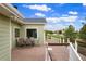 Outdoor dining area on the wooden back deck with scenic backyard views at 41504 Vista Ridge, Parker, CO 80138