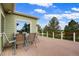 Spacious back deck with dining area and backyard views at 41504 Vista Ridge, Parker, CO 80138