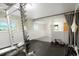 Basement gym with rubber flooring, windows for natural light, and weightlifting equipment at 41504 Vista Ridge, Parker, CO 80138