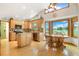 Bright kitchen with wood cabinets, hardwood floors and large bay window at 41504 Vista Ridge, Parker, CO 80138