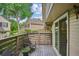 Patio with seating overlooking other townhomes and greenery at 6880 E Appleton Cir, Centennial, CO 80112