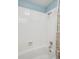 Clean and modern shower area with white tile and contemporary fixtures at 6880 E Appleton Cir, Centennial, CO 80112