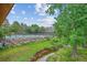 Scenic community featuring a tennis court and a creek at 6880 E Appleton Cir, Centennial, CO 80112