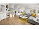 Inviting living area seamlessly connects a cozy fireplace with a comfortable gray sectional sofa at 1896 S Marshall Cir, Lakewood, CO 80232