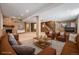 Large finished basement with a stone fireplace, cozy seating, and plenty of open space for entertaining at 26004 E Elmhurst Pl, Aurora, CO 80016