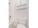 Bathroom featuring a shower, toilet, and upper storage, perfect for a modern home at 26004 E Elmhurst Pl, Aurora, CO 80016