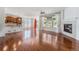 Bright, open-concept space featuring gleaming hardwood floors and ample natural light at 26004 E Elmhurst Pl, Aurora, CO 80016