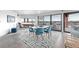 Elegant dining area with contemporary lighting, comfortable seating, and panoramic city views at 100 Park W Ave # 1606, Denver, CO 80205
