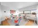 Bright room featuring a large window, modern desk, and playful decorations at 100 Park W Ave # 1606, Denver, CO 80205