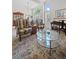 Bright living room with classic furnishings, large windows, and an open layout, ideal for entertaining at 5272 W Capri Pl, Littleton, CO 80123