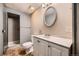 Basement bathroom with shower, toilet and vanity at 5420 Manitou Rd, Littleton, CO 80123