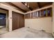 Bedroom with sliding doors and wood shutters at 5420 Manitou Rd, Littleton, CO 80123