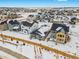 Aerial view of a new home community with houses and open green spaces at 3361 N Buchanan Way, Aurora, CO 80019