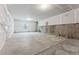 Unfinished basement with high ceilings and ample storage space at 3361 N Buchanan Way, Aurora, CO 80019