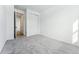 Bedroom with grey carpet, double doors to closet at 3361 N Buchanan Way, Aurora, CO 80019