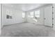 Spacious bedroom with grey carpet and multiple windows at 3361 N Buchanan Way, Aurora, CO 80019