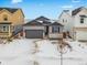 Charming craftsman style home with gray siding and stone accents at 3361 N Buchanan Way, Aurora, CO 80019