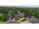 Charming home with mature trees, well manicured lawn, and brick driveway at 6223 W Flora Pl, Denver, CO 80227