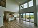 Open-concept living room showcasing a spacious floor plan and abundant natural light at 13358 Blue Amber Ct, Parker, CO 80134