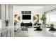 Stylish living room with modern furnishings, large TV, and access to an outdoor patio with great light at 13358 Blue Amber Ct, Parker, CO 80134