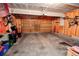 Spacious garage with ample storage and a door for easy access at 1427 Deerwood Dr, Longmont, CO 80504