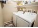 Efficient laundry room with modern washer and dryer, maximizing space and convenience at 1427 Deerwood Dr, Longmont, CO 80504