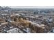 Aerial view of urban neighborhood showcasing the park, residential buildings and city in the distance at 2790 W 25Th Ave # 6, Denver, CO 80211