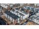 Aerial view showcasing modern townhouses in a neighborhood with clean architectural lines and rooftops at 2790 W 25Th Ave # 6, Denver, CO 80211