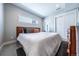 Serene bedroom with a large bed, ample natural light, and closet space at 2790 W 25Th Ave # 6, Denver, CO 80211