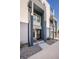 Charming front porch with a contemporary door and sleek design at 2790 W 25Th Ave # 6, Denver, CO 80211