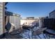 Charming rooftop deck with cozy seating and a fire pit for entertaining at 2790 W 25Th Ave # 6, Denver, CO 80211