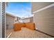Backyard with gravel and wood fence at 13029 E 103Rd Pl, Commerce City, CO 80022