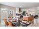 A modern dining area with a stylish table setting, perfect for Gathering gatherings at 13029 E 103Rd Pl, Commerce City, CO 80022