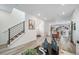 An open-concept living room with modern finishes and abundant natural light at 13029 E 103Rd Pl, Commerce City, CO 80022