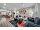 Spacious open-concept living area adjacent to the kitchen, great for entertaining at 13029 E 103Rd Pl, Commerce City, CO 80022