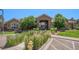 Well-manicured lawn with a clubhouse and a beautiful stone archway entrance at 7440 S Blackhawk St # 14-208, Englewood, CO 80112
