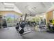 Community gym with modern equipment and mirrors at 7440 S Blackhawk St # 14-208, Englewood, CO 80112