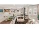 Basement living area with L-shaped sofa, wet bar, and fireplace at 12467 Topaz Vista Way, Castle Pines, CO 80108