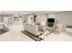 Open basement living room with carpet flooring, and a large sofa at 12467 Topaz Vista Way, Castle Pines, CO 80108