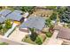 Aerial view of a home with mature trees and a well-kept yard, highlighting the property's desirable location at 1430 Mount Evans Dr, Longmont, CO 80504