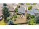 Aerial view of backyard featuring a spacious lawn, patio, garden, and privacy fencing at 1430 Mount Evans Dr, Longmont, CO 80504