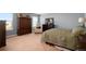 Serene bedroom featuring neutral tones, soft carpet, and ample space for relaxation at 42395 Forest Oaks Dr, Elizabeth, CO 80107