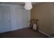 Bedroom with white closet doors and tan walls at 7920 E Phillips Cir, Centennial, CO 80112