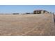Green two-story house with farmland behind at 14077 Indianfield Ct, Hudson, CO 80642