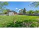 Huge, grassy backyard, shed and privacy fence at 717 E 4Th Ave, Longmont, CO 80504