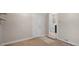 Finished basement area with storage, access to laundry area, and a doorway at 717 E 4Th Ave, Longmont, CO 80504